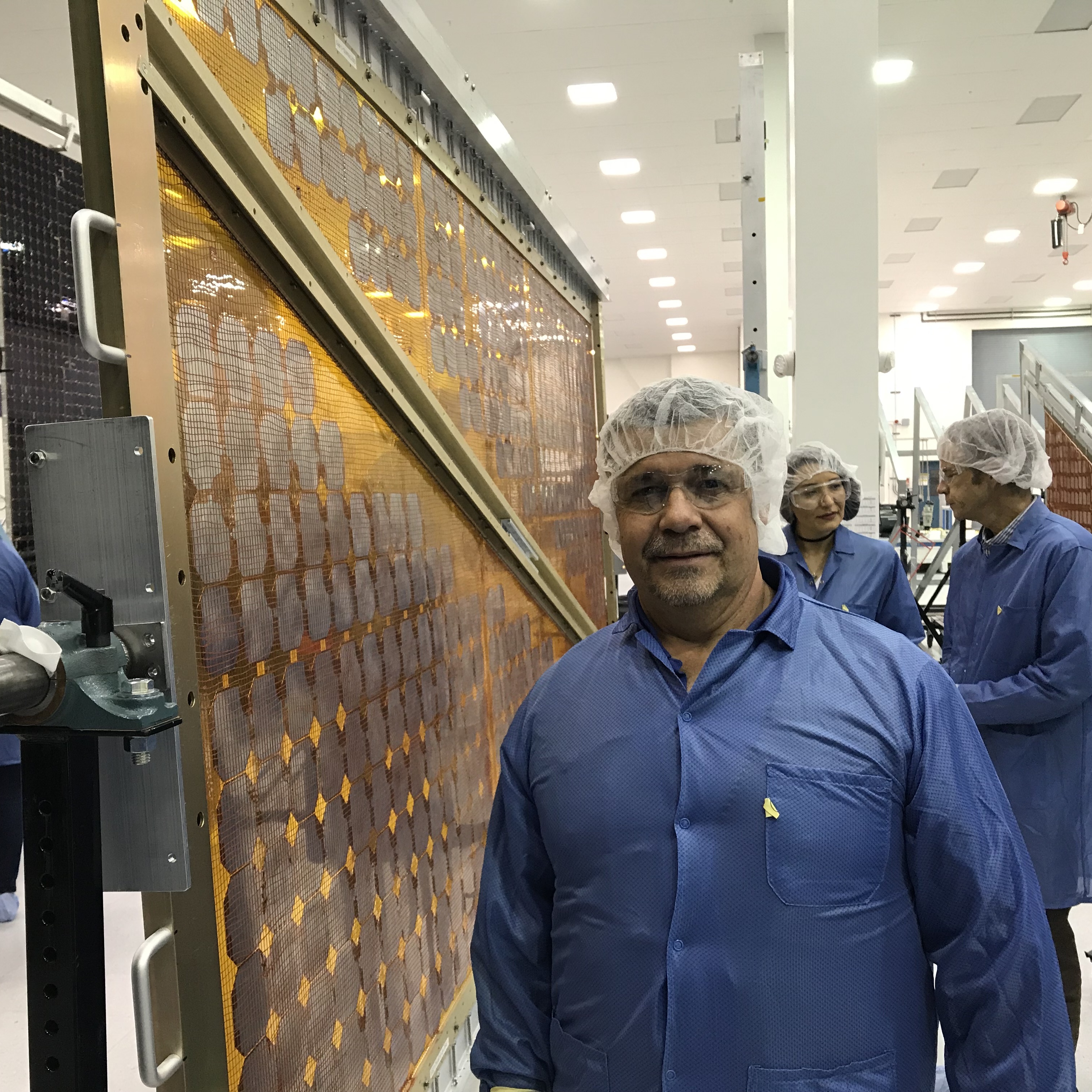 Russ Gehling viewing the pathfinder solar array at the Manufacturing Readiness Review at SolAero in Albuquerque, New Mexico.