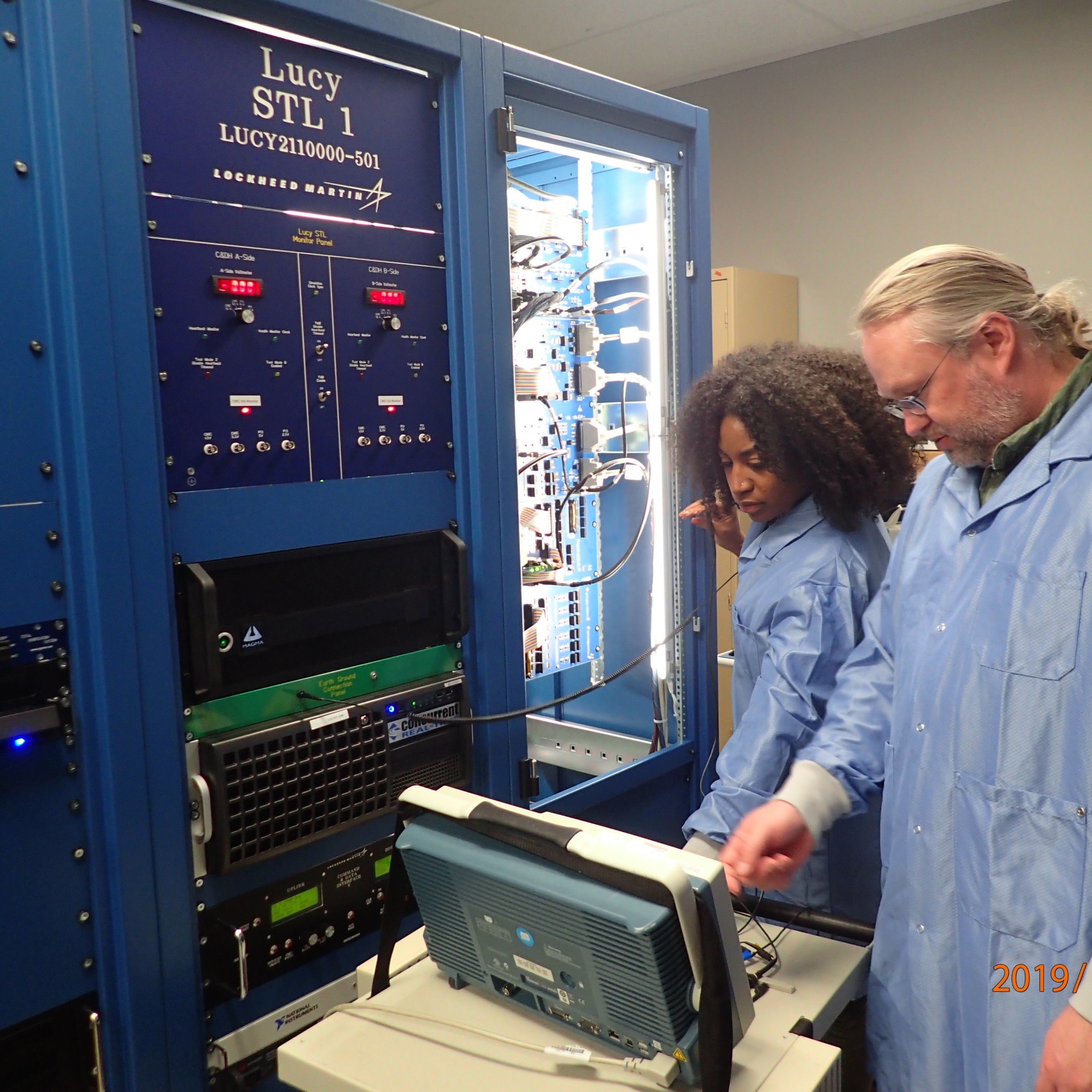 Cametria Weatherspoon and Eric Corson carry out STL-1 Integration at Lockheed Martin in Littleton, Colorado.