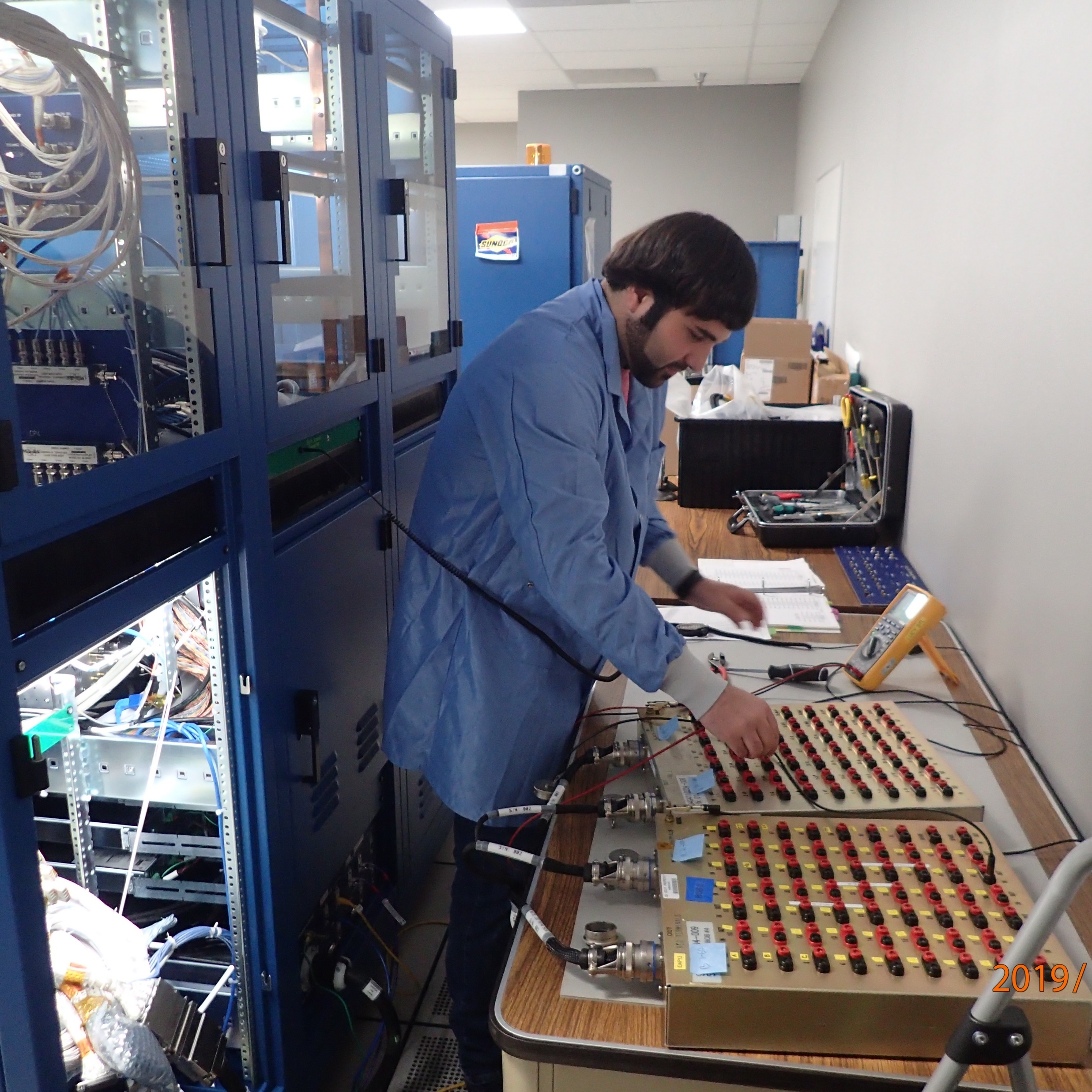 Moataz Dahabra does a STL-1 Harness Checkout at Lockheed Martin in Littleton, Colorado.
