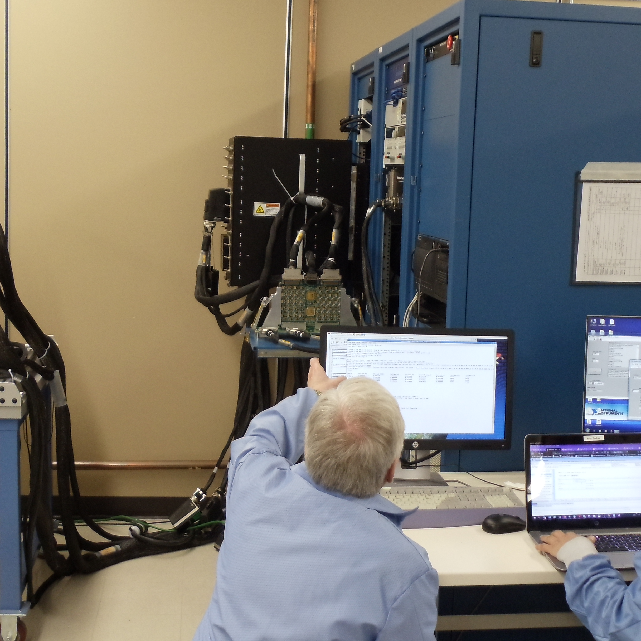 The avionics team tests the avionics box at Lockheed Martin in Littleton, Colorado.